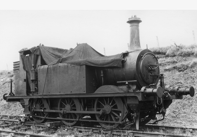 EHLR 0-6-0T No 1, an ex-Brighton 'Terrier' stands with a  tarpaulin covering the cab, boiler and fittings