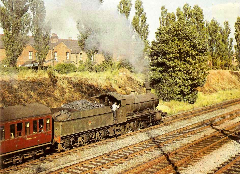 Ex-Great Western Railway 43XX class 2-6-0 No7307 in unlined green livery leaves Acocks Green Station