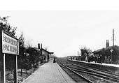 An Edwardian view of Acocks Green station looking in the direction of Leamington as a down train approaches