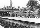 Close up of Acocks Green station's main island platform with the down main platform nearest the camera and the up platform the other side
