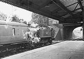 Ex-GWR 2-6-2T 61xx Class No 6144 restarts from the down loop line with empty local carriage stock stock in July 1961