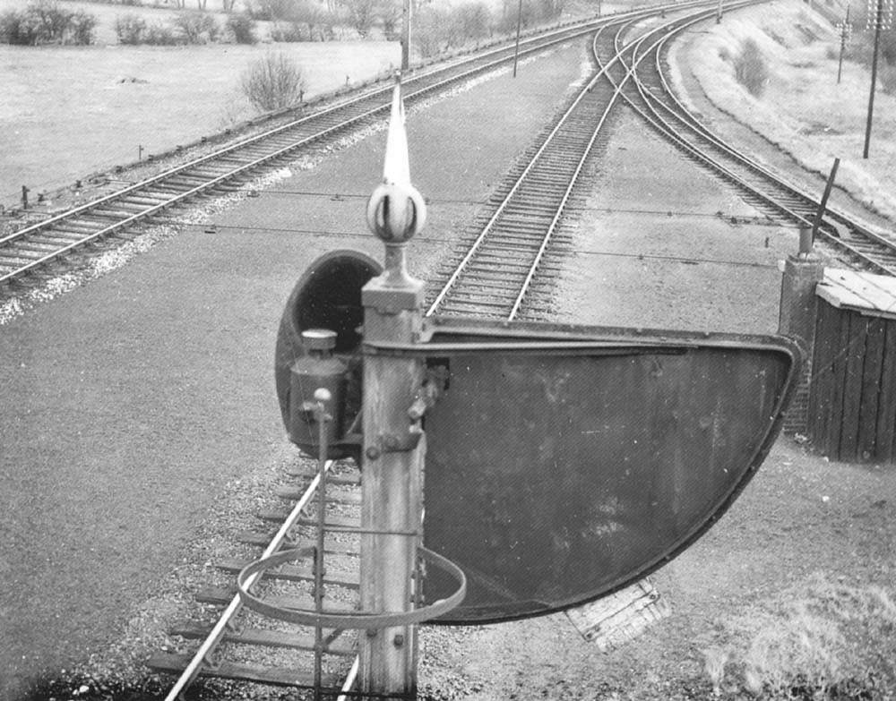 Looking towards Stratford upon Avon a view of the rear of a GWR 'Sighting Board' seen at Bearley North Junction starter signal