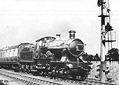 GWR 'Flower' class 4-4-0 No 4105 �Camellia� speeds passt the up distant signal at Bentley Heath crossing