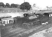 Two GWR 4-4-0 County class locomotives are seen crossing each other at Bentley Heath in August 1931