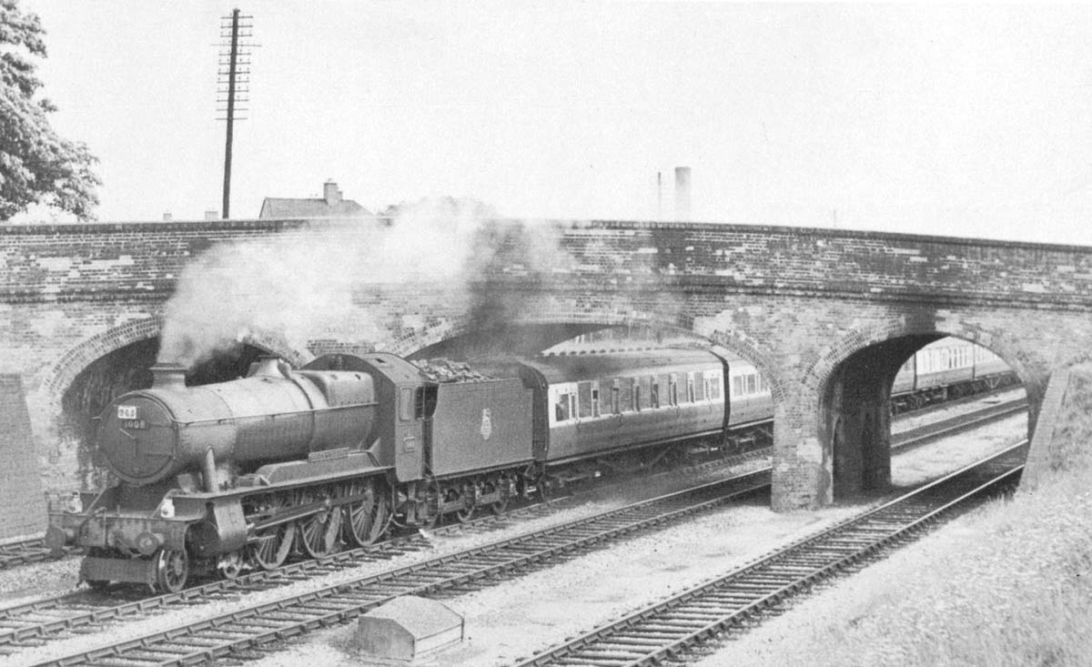 Ex-GWR 4-6-0 County Class No 1008 'County of Cardigan' is seen on a down Bournemouth service on one Saturday in August 1957