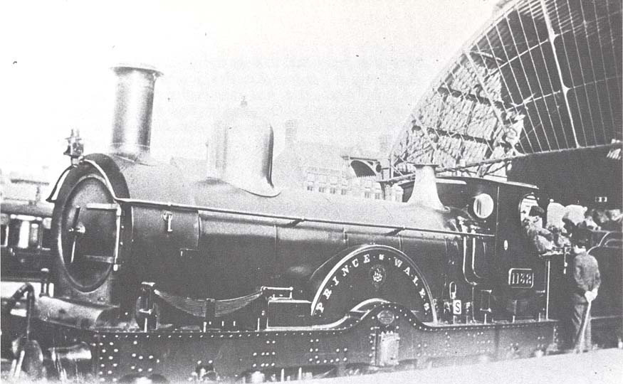 GWR 2-2-2 'Queen' class No 1132 'Prince of Wales' stands at the North end of Snow Hill station's down platform at the head of an express to Wolverhampton