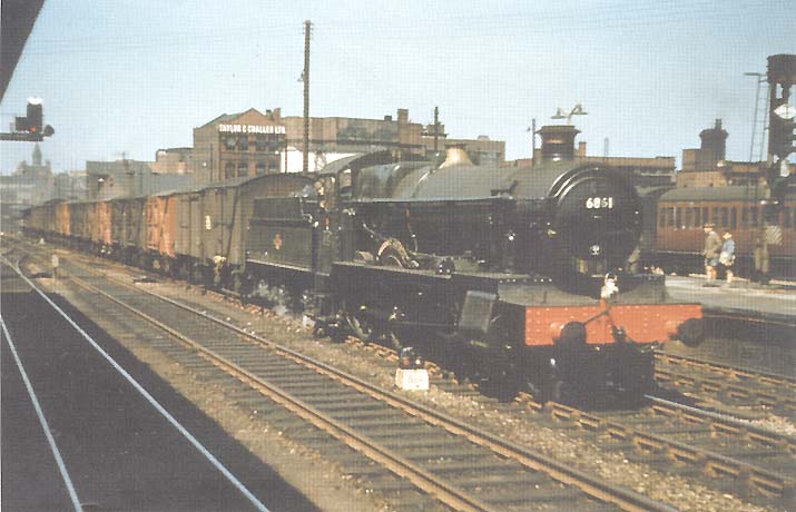 Ex-GWR 4-6-0 Grange class No 6861 'Crynant Grange' is seen passing through Snow Hill on the up through line at the head of a freight train in May 1961
