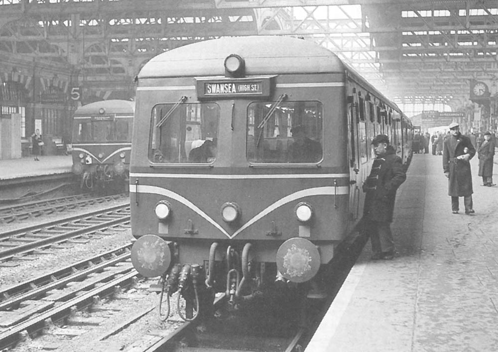 A British Railways 'Cross Country' DMU made up of two three-car units is seen standing at Platform 7 with the 3 40pm Class A express service for Cardiff General