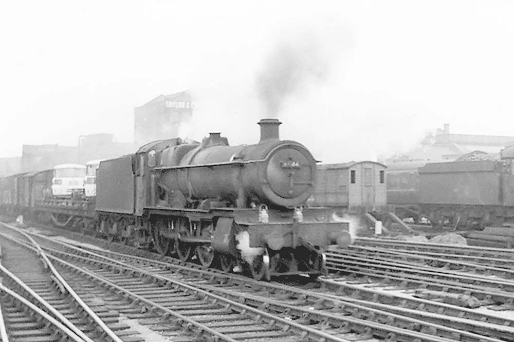 Ex-GWR 4-6-0 Grange class No 6844 'Penhydd Grange' is seen approaching Snow Hill on the up through road at the head of a Class C vacuum fitted freight service