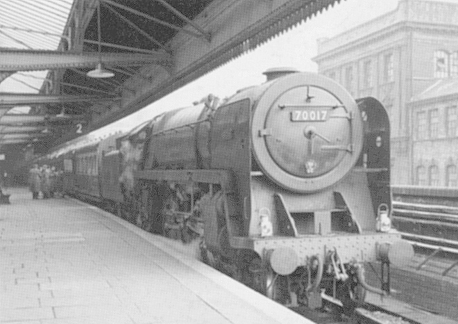 British Railways 4-6-2 'Britannia class No 70017 'Arrow' is seen on the 5 15pm service to Hereford and Cardiff on Sunday 9th March 1958