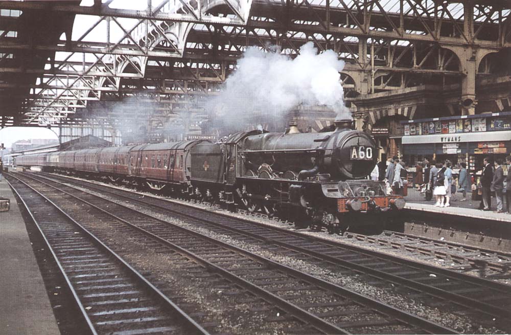 Ex-GWR 4-6-0 King class No 6002 'King William IV' is seen arriving at Platform 7 whilst at the head of the 7 20am Pwllheli to Paddington service on 12th August 1961