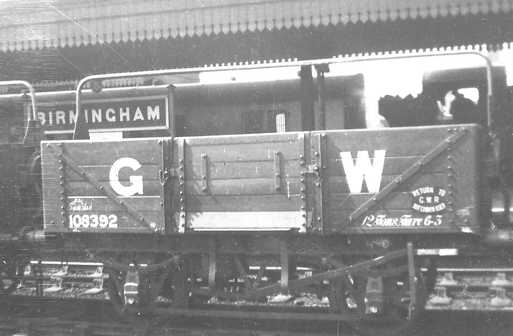 GWR five plank fitted open wagon No 108392 with other similar wagons on the down main line at the north end of Birmingham Snow Hill Station circa 1936