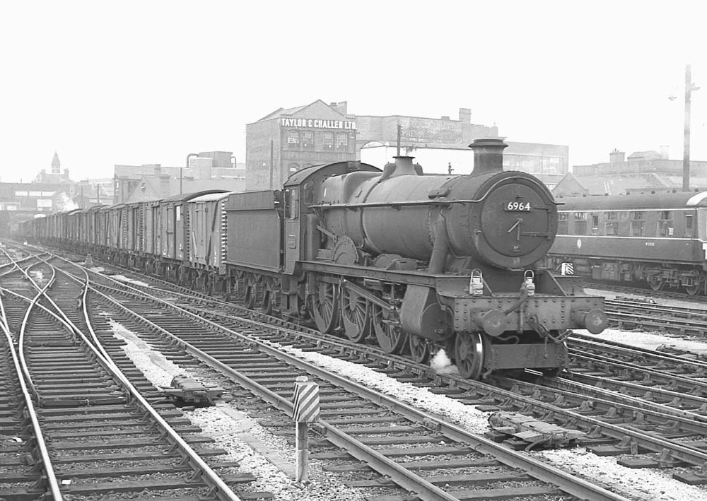 Ex-GWR 4-6-0 Modified Hall No 6964 'Thornbridge Hall' hurries through Snow Hill station with an up Type 3 working on 3rd September 1962