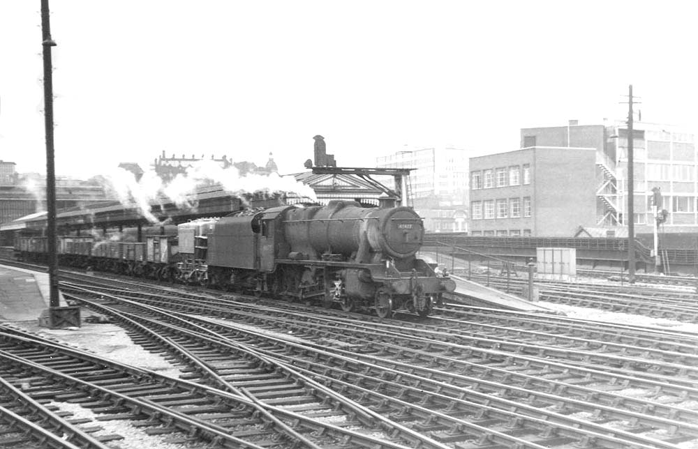 Ex-LMS 8F 2-8-0 No 48477, allocated to Bescot shed,  passes through Snow Hill on a down goods service to Hockley in 1965