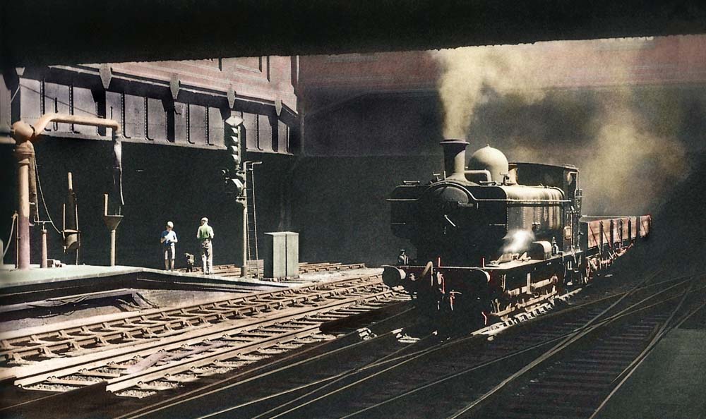 Ex-GWR 0-6-0PT No 8737 emerges out of the black depths of Snow Hill Tunnel, with a trip freight from Bordesley to Hockley on 4th July 1959