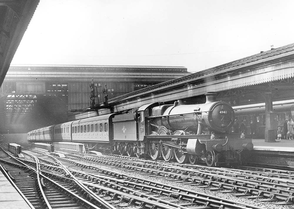 Ex-GWR 4-6-0 Hall class No 4941 'Llangedwyn Hall' is seen standing at Platform 6 on a down Class A express service to Wolverhampton circa 1958