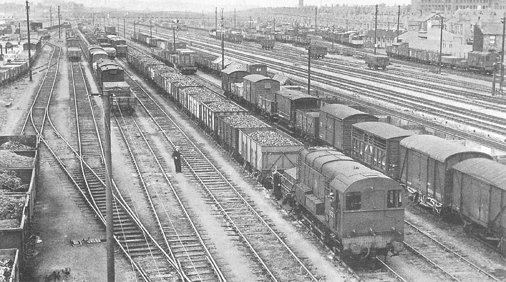 View of Bordesley Goods Yard looking south towards Small Heath station and showing Small Heath Road bridge crossing the GWR line in the distance