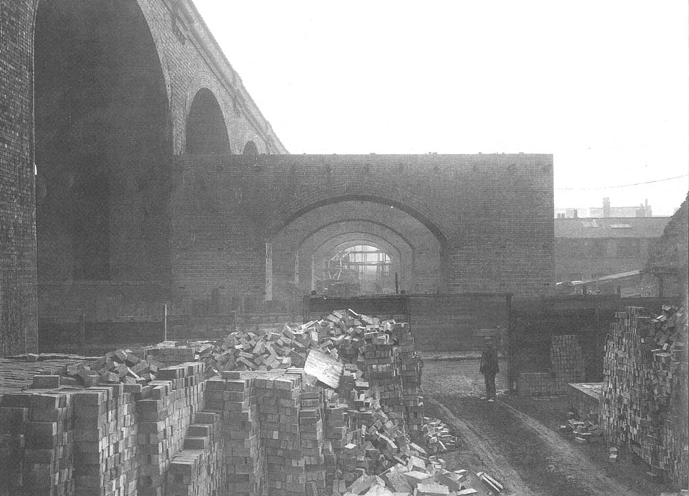 In September 1912 the construction of the massive brick arches alongside the existing viaduct was progressing