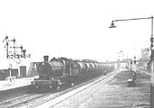 Ex-GWR class 38XX 2-8-0 No 3864 with a block oil train on the Down Main at the southern end of the Station