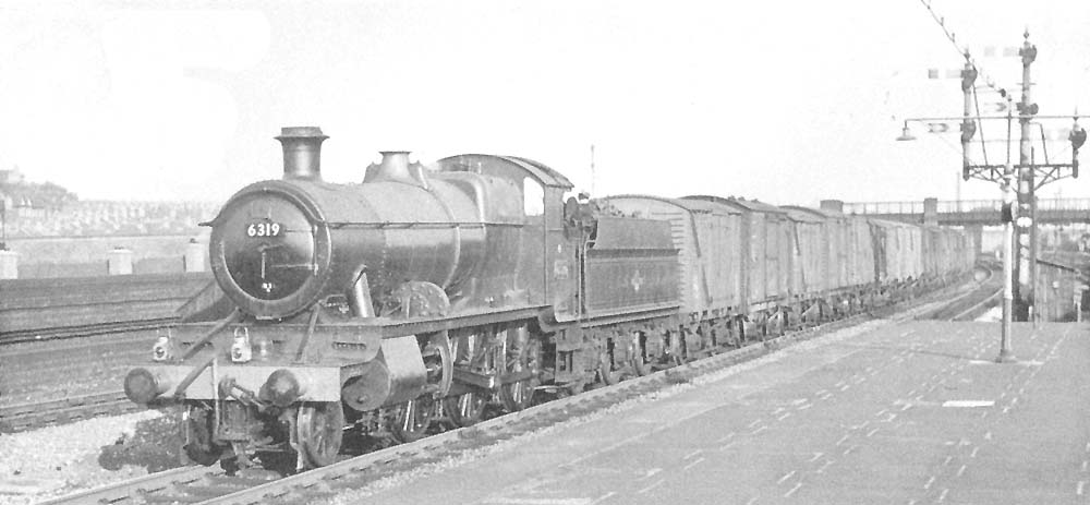 Ex-GWR 2-6-0 No 6319 passes through Bordesley station on a Type 4 down freight in July 1961