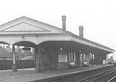 Close up of the relief down and up platforms and buildings with the steps to the road at the far end