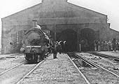 Photograph showing the Birmingham end of Bordesley engine shed with a locomotive over one of the ash pits