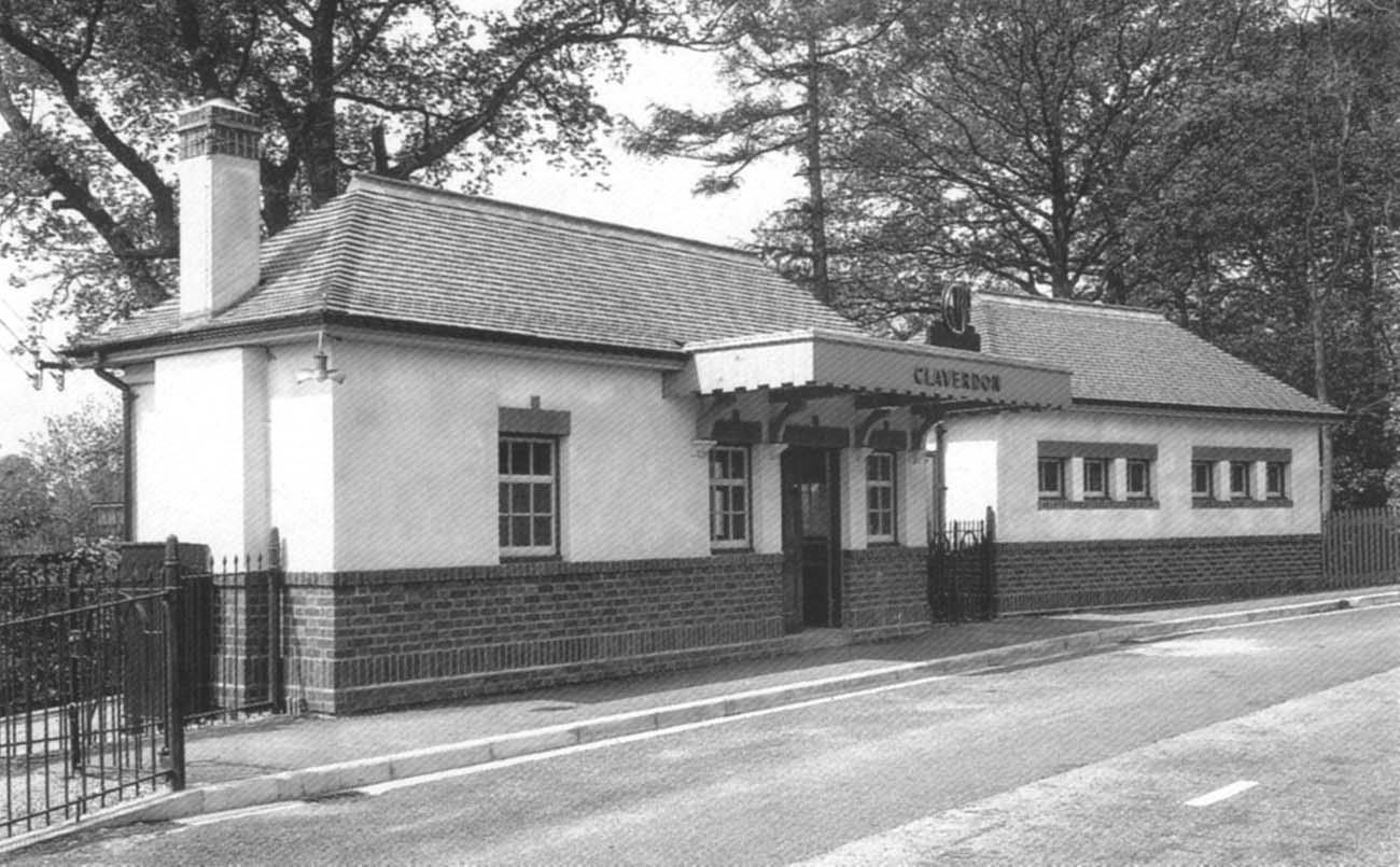 View showing the road-side booking office, parcels office and cycle shelter while at the front corner is an electric light