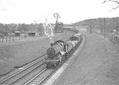 Ex-GWR 2-6-0 43xx class No 5370 is seen on a down freight plodding up the 1 in 150 gradient towards Danzey for Tanworth station on 25th March 1956