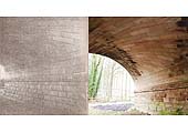 Two images of one of the elliptical arches of the bridge taken some 100 hundred years apart