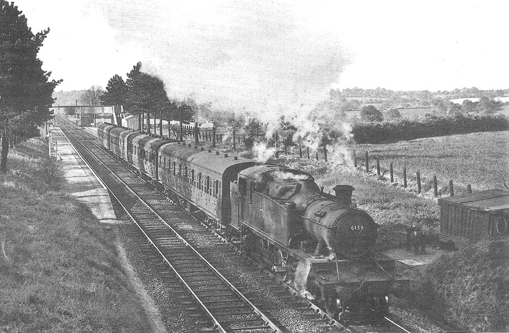 Ex-Great Western Railway 2-6-2T 61xx class No 6139 leaves the dappled shade of Danzey station with the Moor Street (dep 5:15pm) to Henley-in-Arden local passenger service