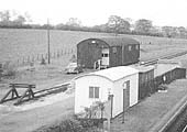 Close up showing the buffer stops, the storage facility on the platform and the goods shed in Danzey for Tanworth station's goods yard