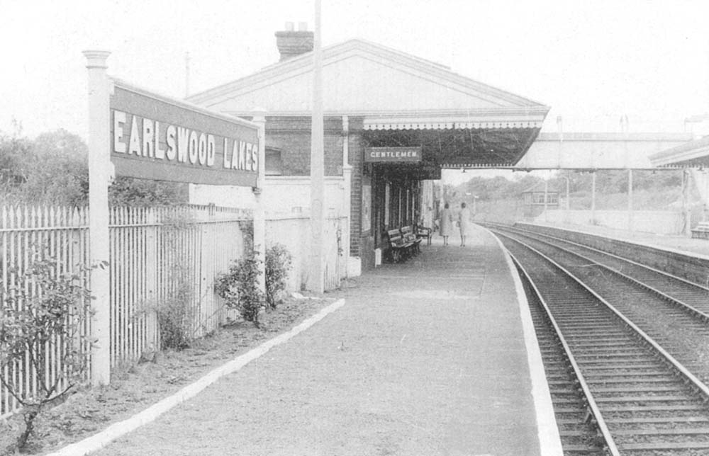 View looking in the direction of Stratford upon Avon along the down platform with Earlswood Lakes signal box in the distance