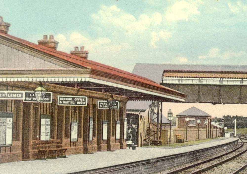 Close up of the down platform showing the large number of lanterns and lampposts used to light the station