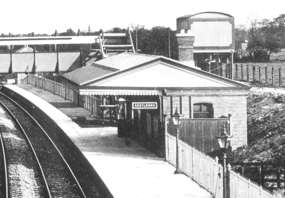 Close up showing the water tower and the up platform's passenger facilities which unusually duplicated the facilities on the down platform