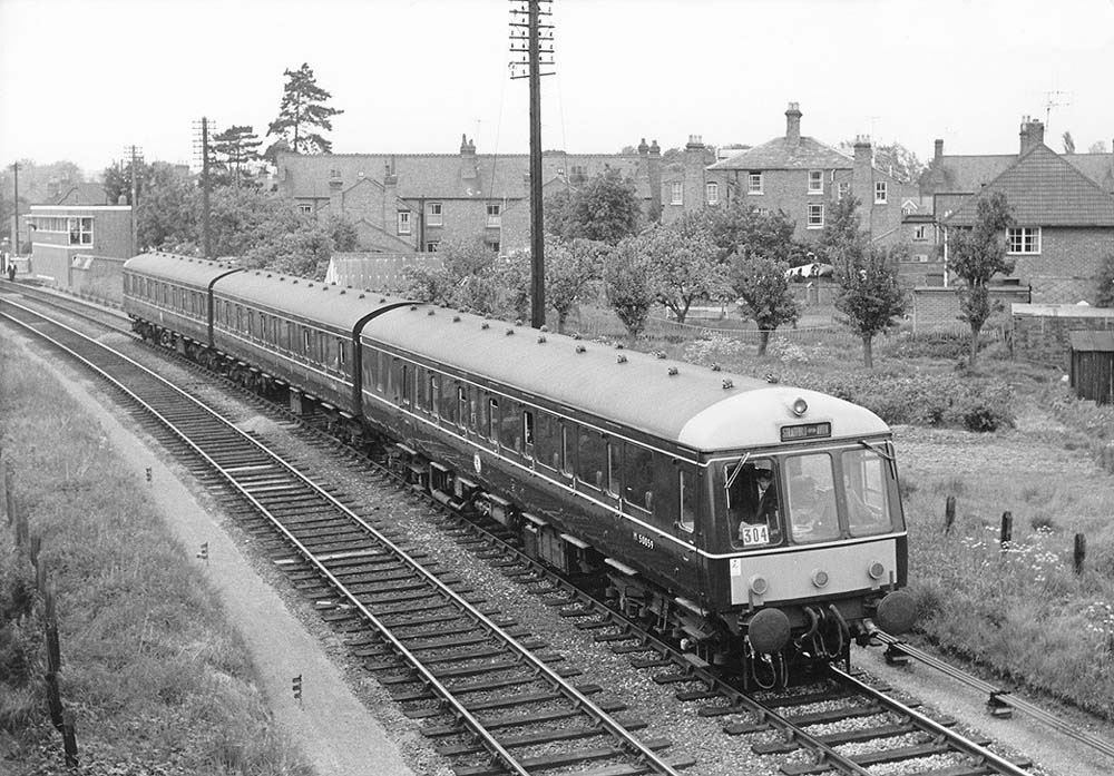 A three car Western Region suburban DMU which forms the 6:03pm Stratford to Honeybourne service on 23 May 1964