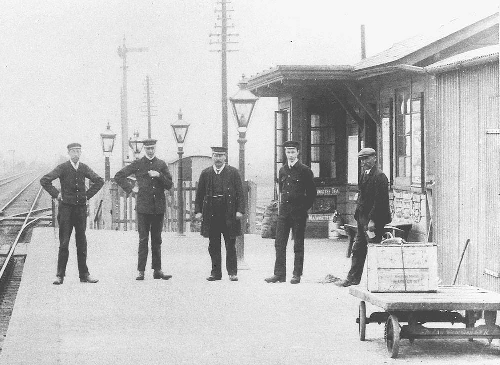Close up showing some of Fenny Compton station's staff standing in line posed for the photographer