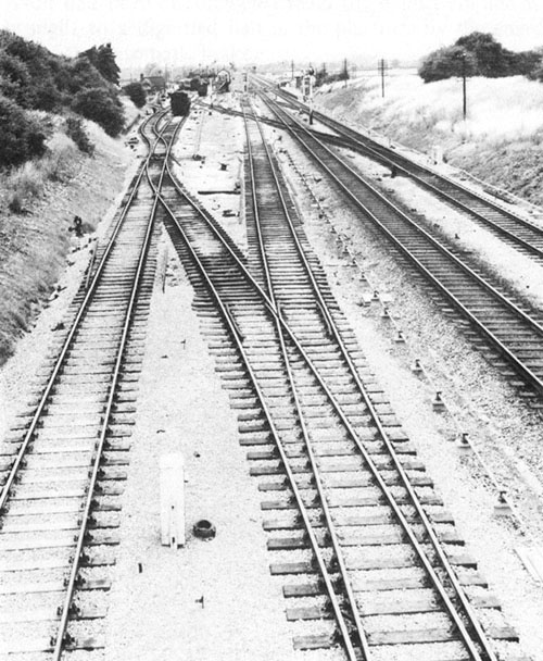 View of the 1960 revised track layout enabling GWR iron ore traffic from Banbury to join the SMJ route