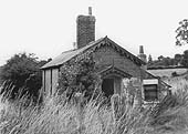 A 1965 view of the former crossing keeper's cottage at Spencer's Level Crossing seen shortly before its demolition