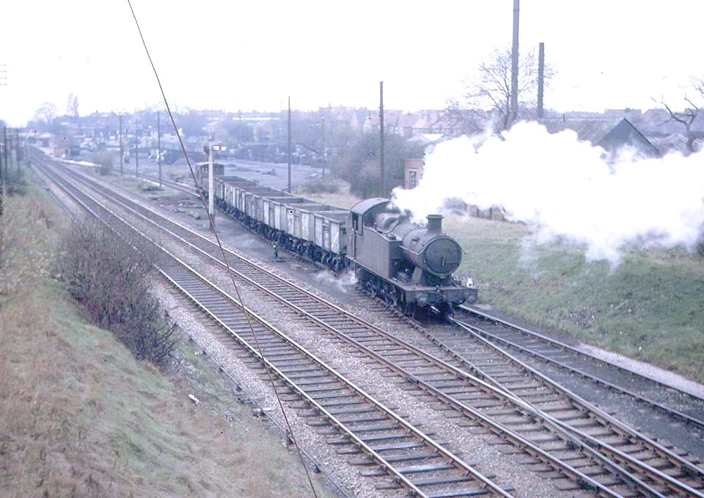 Ex-Great Western Railway 56xx class 0-6-2T No 5605 leaves Hall Green Goods Yard with a local goods on Friday 9th April 1965