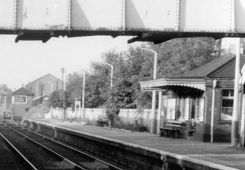 Close up showing the down platform's passenger facilities comprising of a waiting room and Gentlemen's toilet facilities