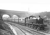 GWR 2-6-2T No 3909 is seen with an up empty stock working comprising of six-wheel coaches