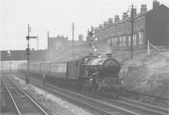 Ex-GWR 4-6-0 King class No 6011 'King James I' approaches Handsworth & Smethwick on 22nd June 1956