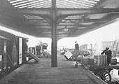 View of porters using the extended  platform located on the Birmingham side of the Goods Shed in 1933