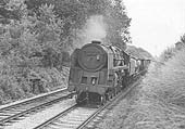 BR Class 9F 2-10-0 No 92090 approaches the southern end of Harbury tunnel on a down mineral train on 18th July 1966