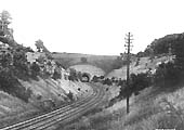 View of the northern brick portal showing the line snaking through the short tunnel