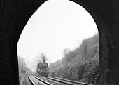 An unidentified ex-GWR 4-6-0 King Class locomotive approaches Harbury Tunnel with a down express service