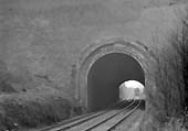 Ex-GWR 4-6-0 No 6008 'King James II' approaches the East end of Harbury tunnel on 9th February 1952