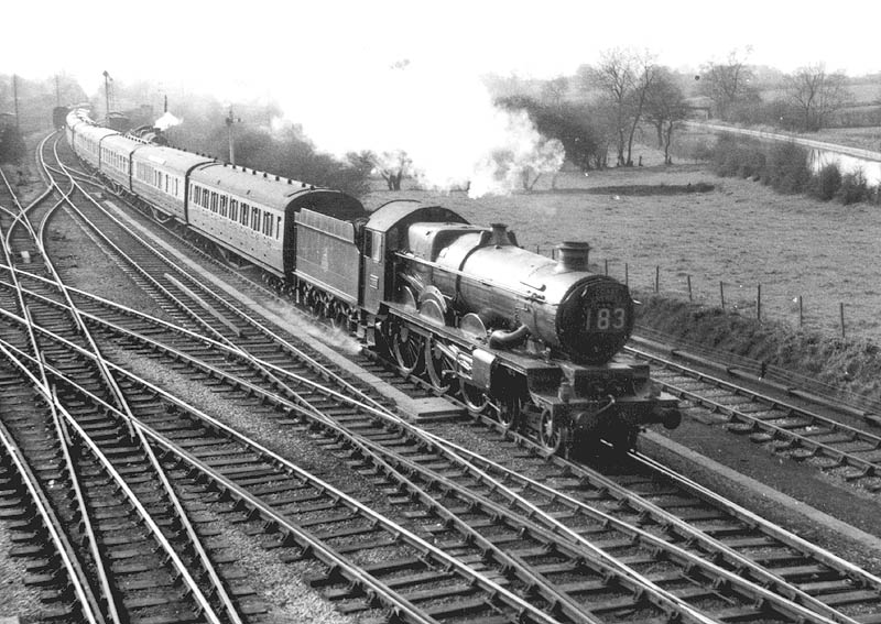 GWR 4-6-0 Modified Castle (5098 class) No 7033 'Hartlebury Castle' on the up Cambrian Coast express