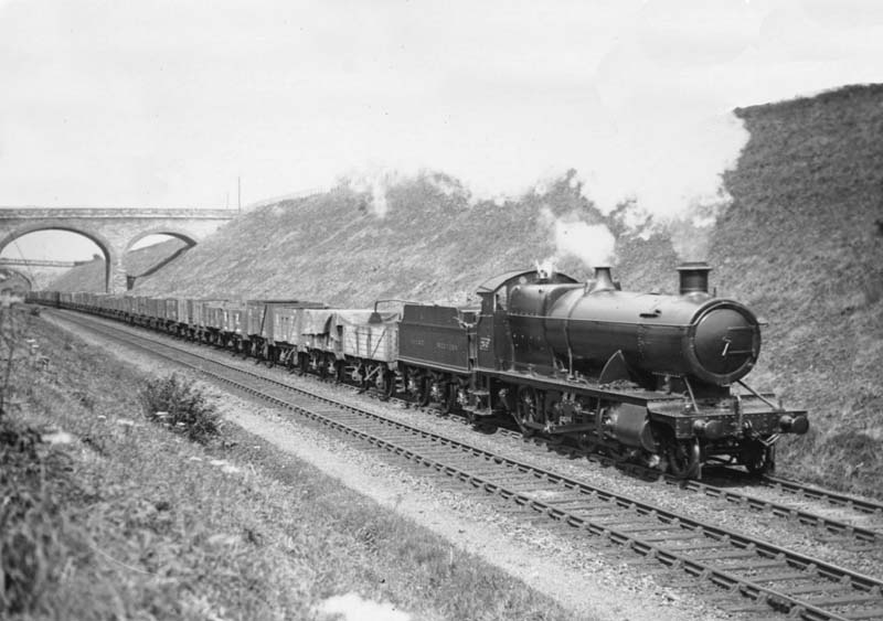 GWR 28xx Class 2-8-0 No 2840 is seen breasting Hatton Bank with a Class J intermediate stopping mineral train