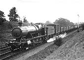 GWR 28xx Class 2-8-0 No 2810 is seen heading a Class D down express freight service on Hatton Bank